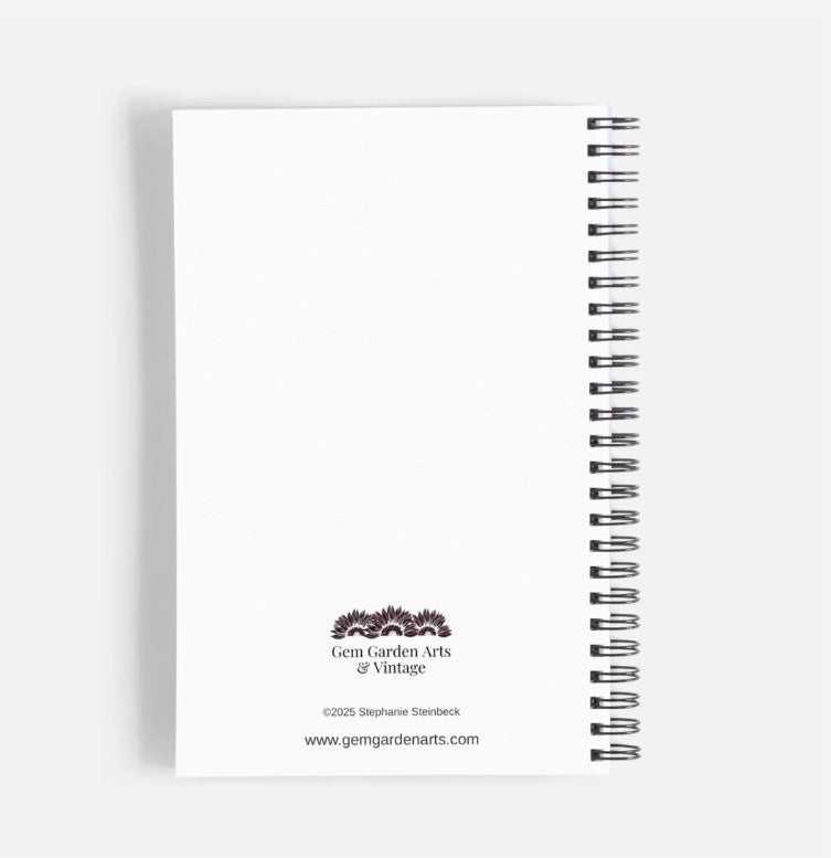 a spiral notebook with a logo on it